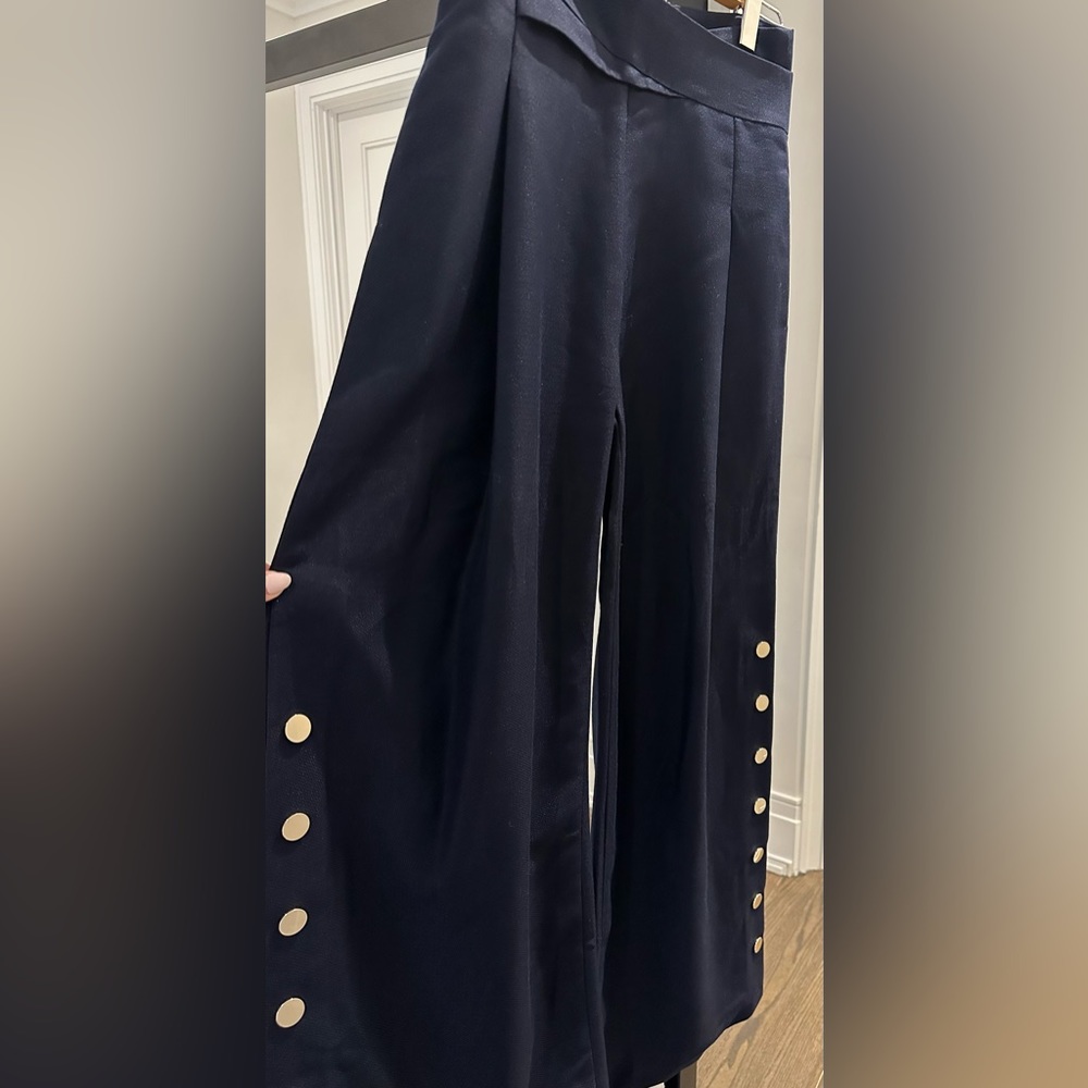 Navy wide leg pants with gold buttons